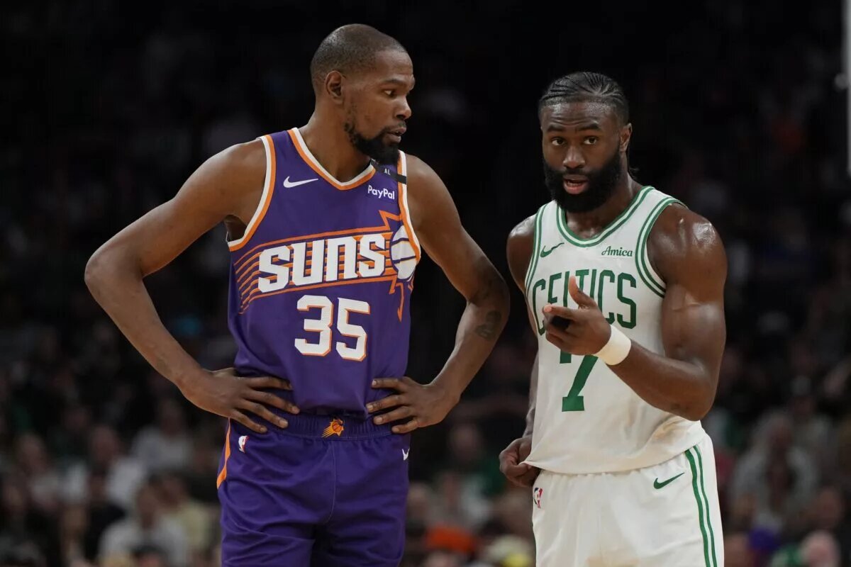 Phoenix Suns forward Kevin Durant (35) and Boston Celtics guard Jaylen Brown (7) talk