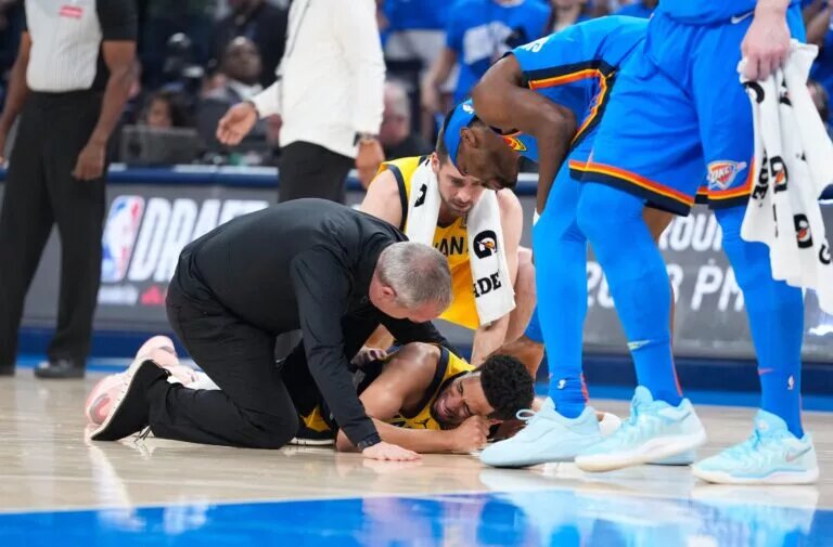 Indiana Pacers guard Tyrese Haliburton (0) reacts after suffering an injury