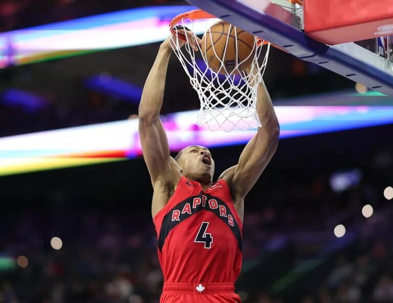 Mar 30, 2025; Philadelphia, Pennsylvania, USA; Toronto Raptors forward Scottie Barnes (4) dunks the ball against the Philadelphia 76ers during the third quarter at Wells Fargo Center. Mandatory Credit: Bill Streicher-Imagn Images