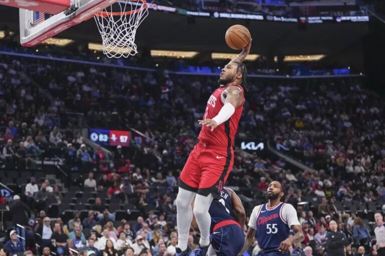 Apr 9, 2025; Inglewood, California, USA; Houston Rockets guard Cam Whitmore (7) dunks against the Los Angeles Clippers in the second half at Intuit Dome. Mandatory Credit: Kirby Lee-Imagn Images