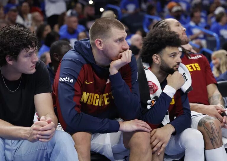 May 18, 2025; Oklahoma City, Oklahoma, USA; Denver Nuggets center Nikola Jokic (15) watches the game from the bench in the fourth quarter against the Oklahoma City Thunder in game seven of the second round for the 2025 NBA Playoffs at Paycom Center. Mandatory Credit: Alonzo Adams-Imagn Images