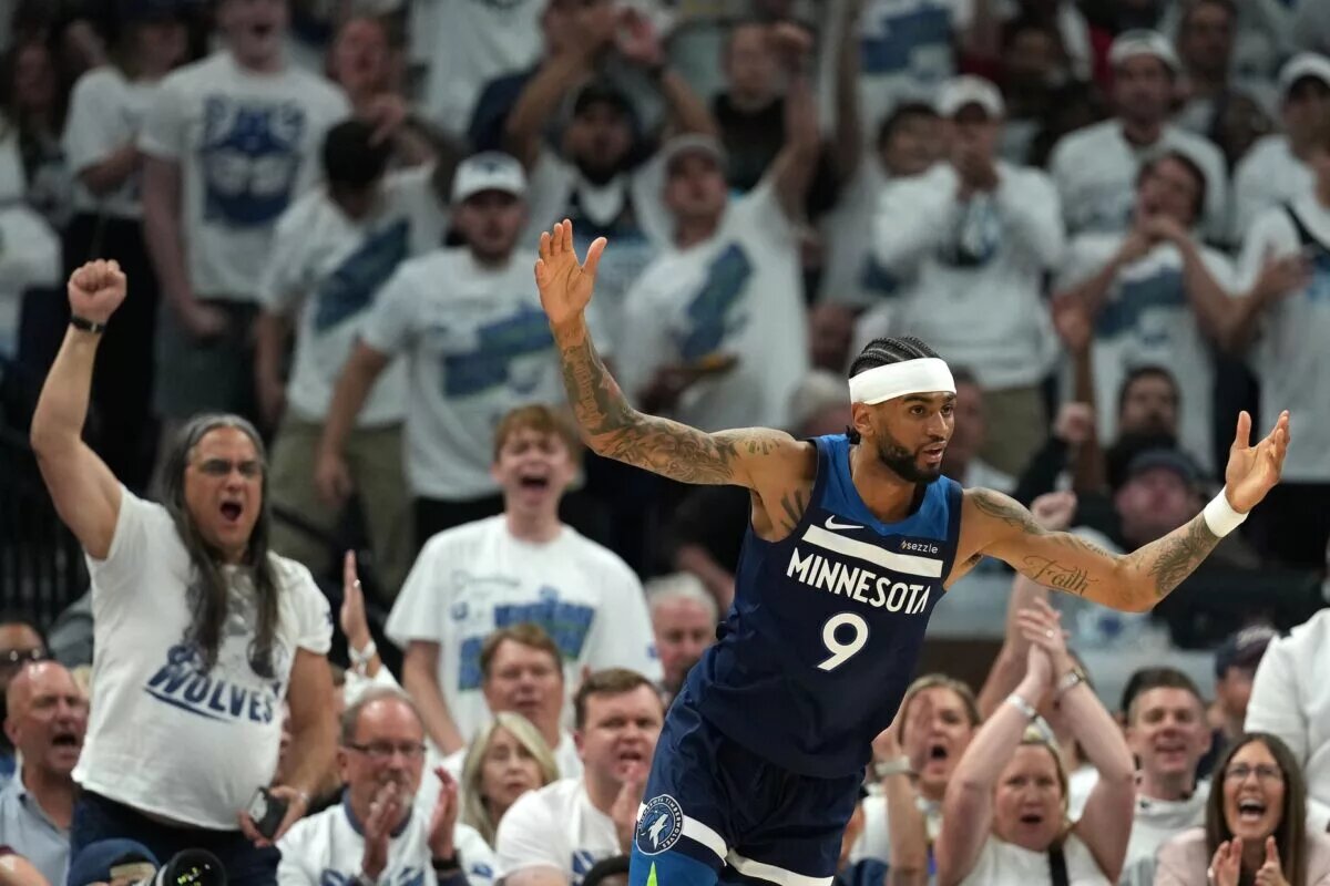 May 26, 2025; Minneapolis, Minnesota, USA; Minnesota Timberwolves guard Nickeil Alexander-Walker (9) reacts against the Oklahoma City Thunder in the first half during game four of the western conference finals for the 2025 NBA Playoffs at Target Center. Mandatory Credit: Jesse Johnson-Imagn Images
