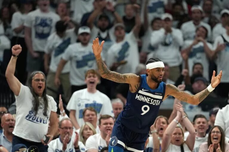 May 26, 2025; Minneapolis, Minnesota, USA; Minnesota Timberwolves guard Nickeil Alexander-Walker (9) reacts against the Oklahoma City Thunder in the first half during game four of the western conference finals for the 2025 NBA Playoffs at Target Center. Mandatory Credit: Jesse Johnson-Imagn Images