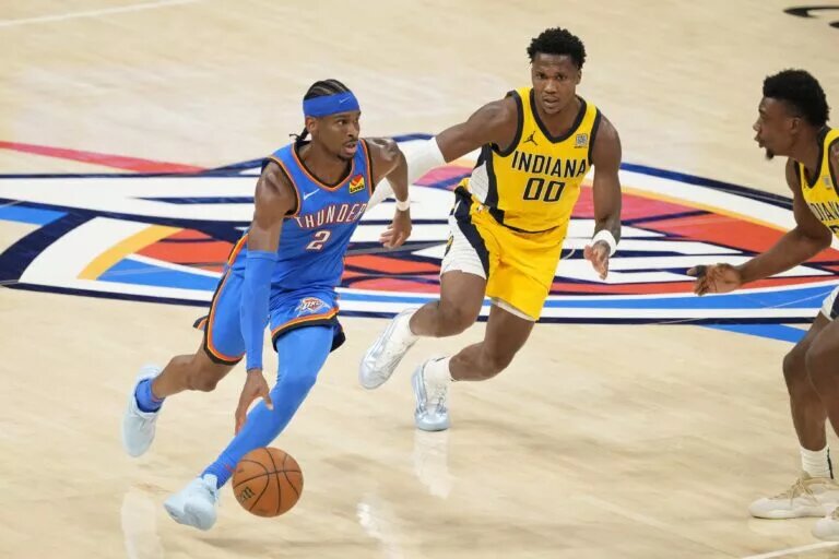 Jun 8, 2025; Oklahoma City, Oklahoma, USA; Oklahoma City Thunder guard Shai Gilgeous-Alexander (2) dribbles the ball against the Indiana Pacers during the second half during game two of the 2025 NBA Finals at Paycom Center. Mandatory Credit: Kyle Terada-Imagn Images