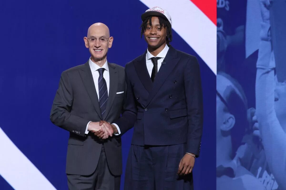 Jun 25, 2025; Brooklyn, NY, USA; Tre Johnson stands with NBA commissioner Adam Silver after being selected as the sixth pick by the Washington Wizards in the first round of the 2025 NBA Draft at Barclays Center. Mandatory Credit: Brad Penner-Imagn Images