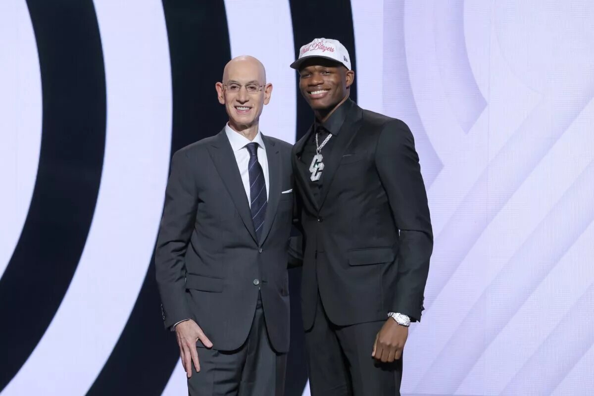 Cedric Coward stands with NBA commissioner Adam Silver after being selected as the 11th pick by the Portland Trail Blazers in the first round of the 2025 NBA Draft at Barclays Center.