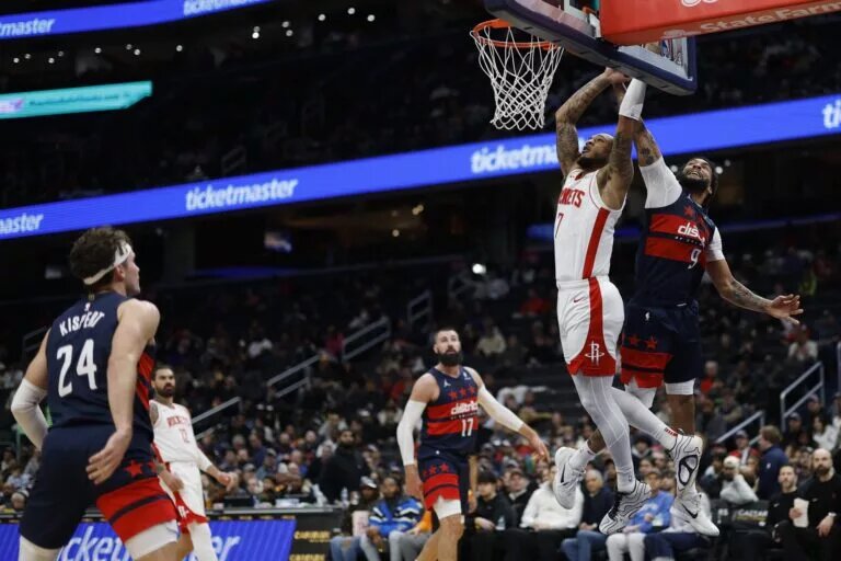 Houston Rockets wing Cam Whitmore attempts dunk against Washington Wizards