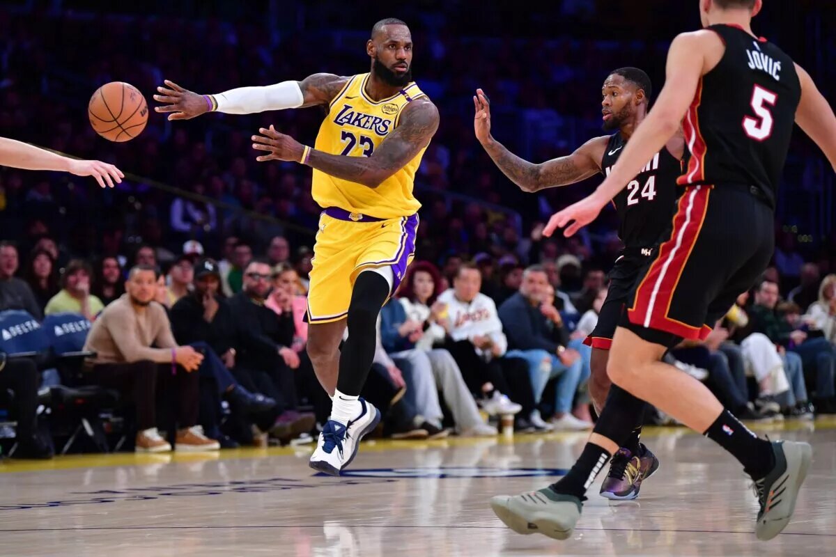 Los Angeles Lakers forward LeBron James passes against Miami Heat