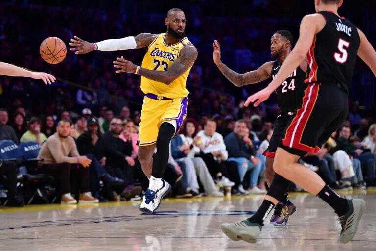 Los Angeles Lakers forward LeBron James passes against Miami Heat