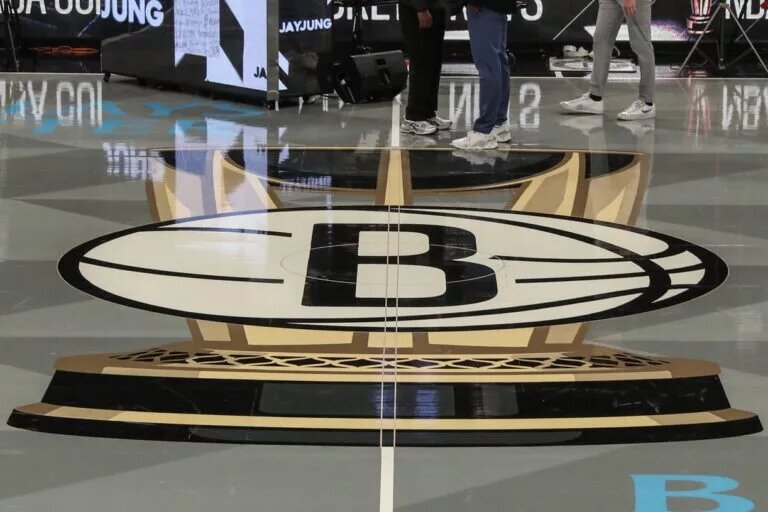The Brooklyn Nets NBA Cup logo at center court before tip-off against the Orlando Magic at Barclays Center.