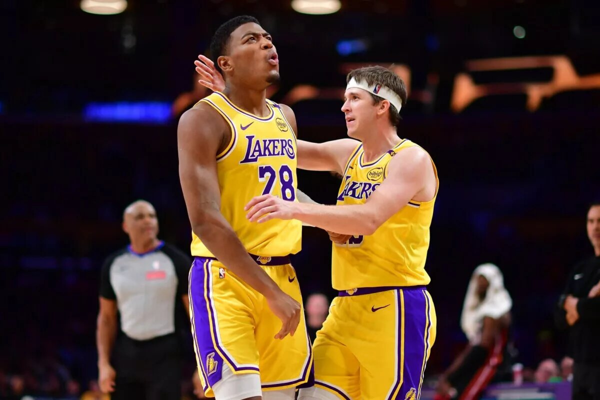 January 15, 2025; Los Angeles, California, USA; Los Angeles Lakers forward Rui Hachimura (28) reacts with guard Austin Reaves (15) after scoring a basket and drawing the foul against the Miami Heat during the second half at Crypto.com Arena. Mandatory Credit: Gary A. Vasquez-Imagn Images