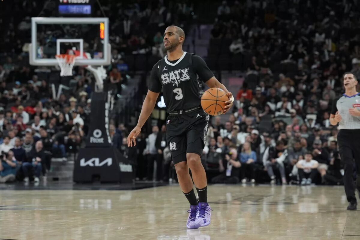 Jan 29, 2025; San Antonio, Texas, USA; San Antonio Spurs guard Chris Paul (3) dribbles up the court in the second half against the LA Clippers at Frost Bank Center. Mandatory Credit: Daniel Dunn-Imagn Images