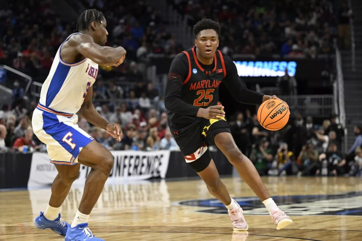 Mar 27, 2025; San Francisco, CA, USA; Maryland Terrapins center Derik Queen (25) dribbles down court past Florida Gators center Rueben Chinyelu (9) during the second half during a West Regional semifinal of the 2025 NCAA tournament at Chase Center. Mandatory Credit: Eakin Howard-Imagn Images