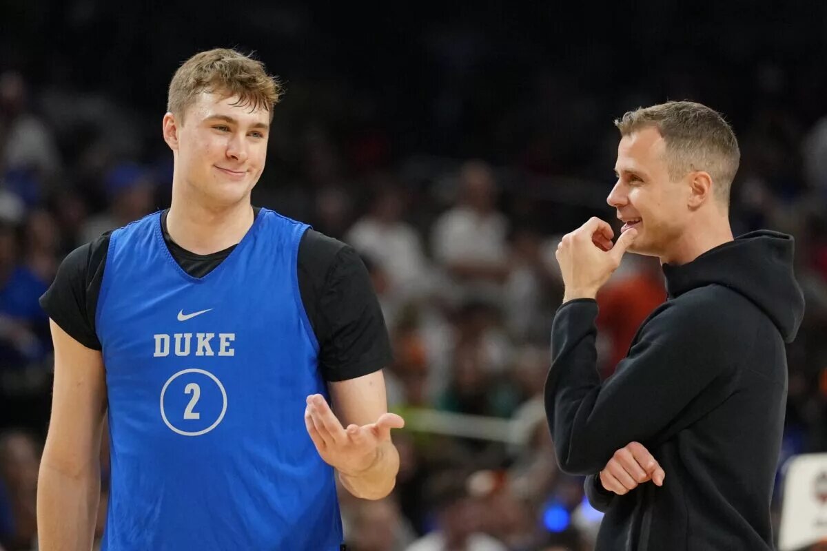 Jon Scheyer chatting with Cooper Flagg but will now be looking for Duke Basketball Director of Player Development.