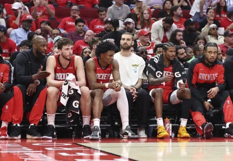 Houston Rockets center Alperen Sengun (28) and forward Amen Thompson (1) and guard Jalen Green