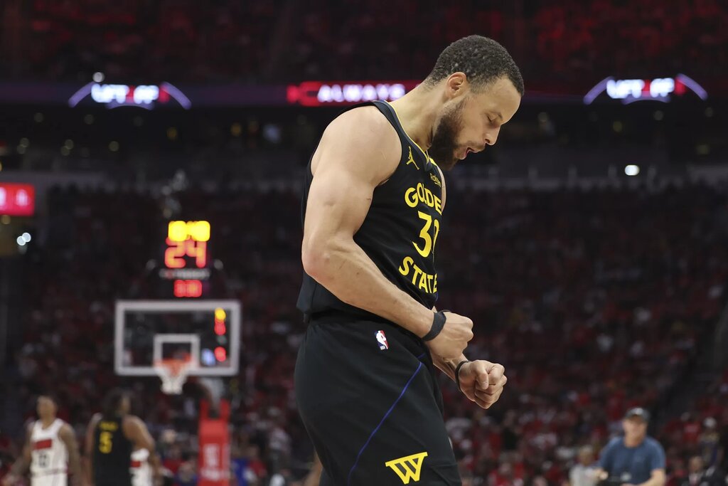 Golden State Warriors guard Stephen Curry (30) reacts after a play during game seven of the first round for the 2025 NBA Playoffs against the Houston Rockets at Toyota Center. 