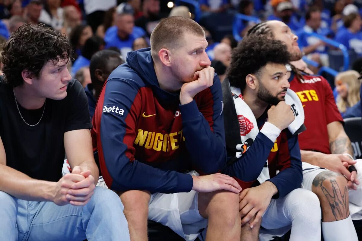 May 18, 2025; Oklahoma City, Oklahoma, USA; Denver Nuggets center Nikola Jokic (15) watches the final minutes of a game against the Oklahoma City Thunder from the bench in the fourth quarter during game seven of the second round for the 2025 NBA Playoffs at Paycom Center. Mandatory Credit: Alonzo Adams-Imagn Images