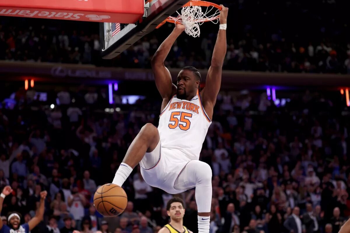 May 29, 2025; New York, New York, USA; New York Knicks center Ariel Hukporti (55) dunks against the Indiana Pacers in the fourth quarter during game five of the eastern conference finals for the 2025 NBA Playoffs at Madison Square Garden. Mandatory Credit: Vincent Carchietta-Imagn Images