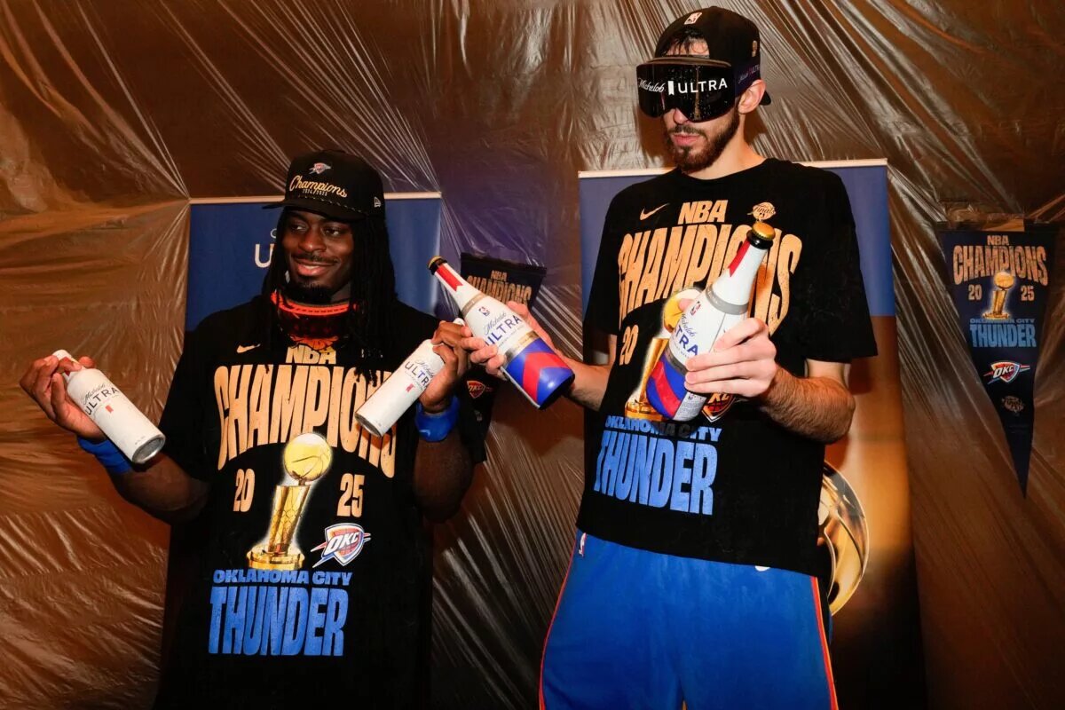 Jun 22, 2025; Oklahoma City, Oklahoma, USA; Oklahoma City Thunder guard Luguentz Dort (5) and forward Chet Holmgren (7) celebrate after winning game seven of the 2025 NBA Finals against the Indiana Pacers at Paycom Center. Mandatory Credit: Kyle Terada-Imagn Images