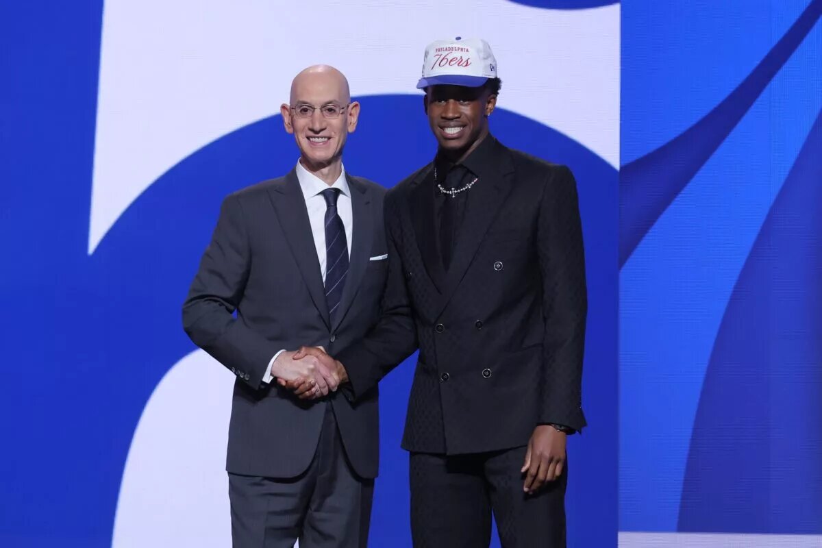Jun 25, 2025; Brooklyn, NY, USA; VJ Edgecombe stands with NBA commissioner Adam Silver after being selected as the third pick by the Philadelphia 76ers in the first round of the 2025 NBA Draft at Barclays Center. Mandatory Credit: Brad Penner-Imagn Images