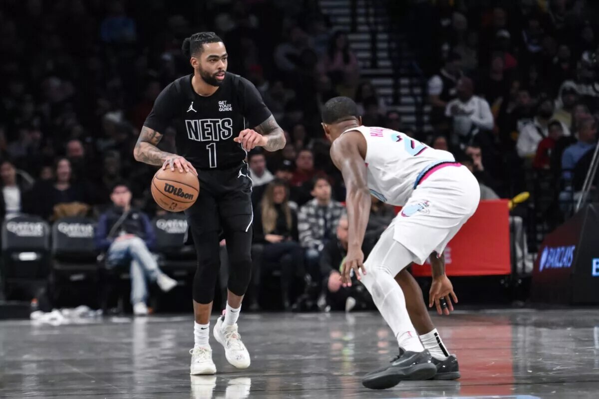 Brooklyn Nets guard D'Angelo Russell (1) controls the ball against Miami Heat forward Haywood Highsmith (24)