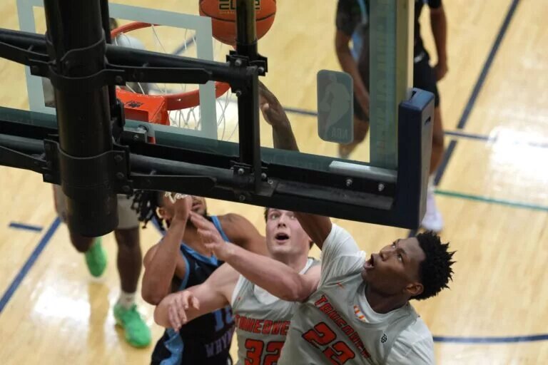 July 17, 2024; North Augusta, S.C., USA; Team Takeover's Jordan Smith Jr. (23) shoots the ball during the Team Takeover and WhyNot game at the Nike Peach Jam at Riverview Park Activities Center. Team Takeover won 64-62. Mandatory Credit: Katie Goodale-USA TODAY Network