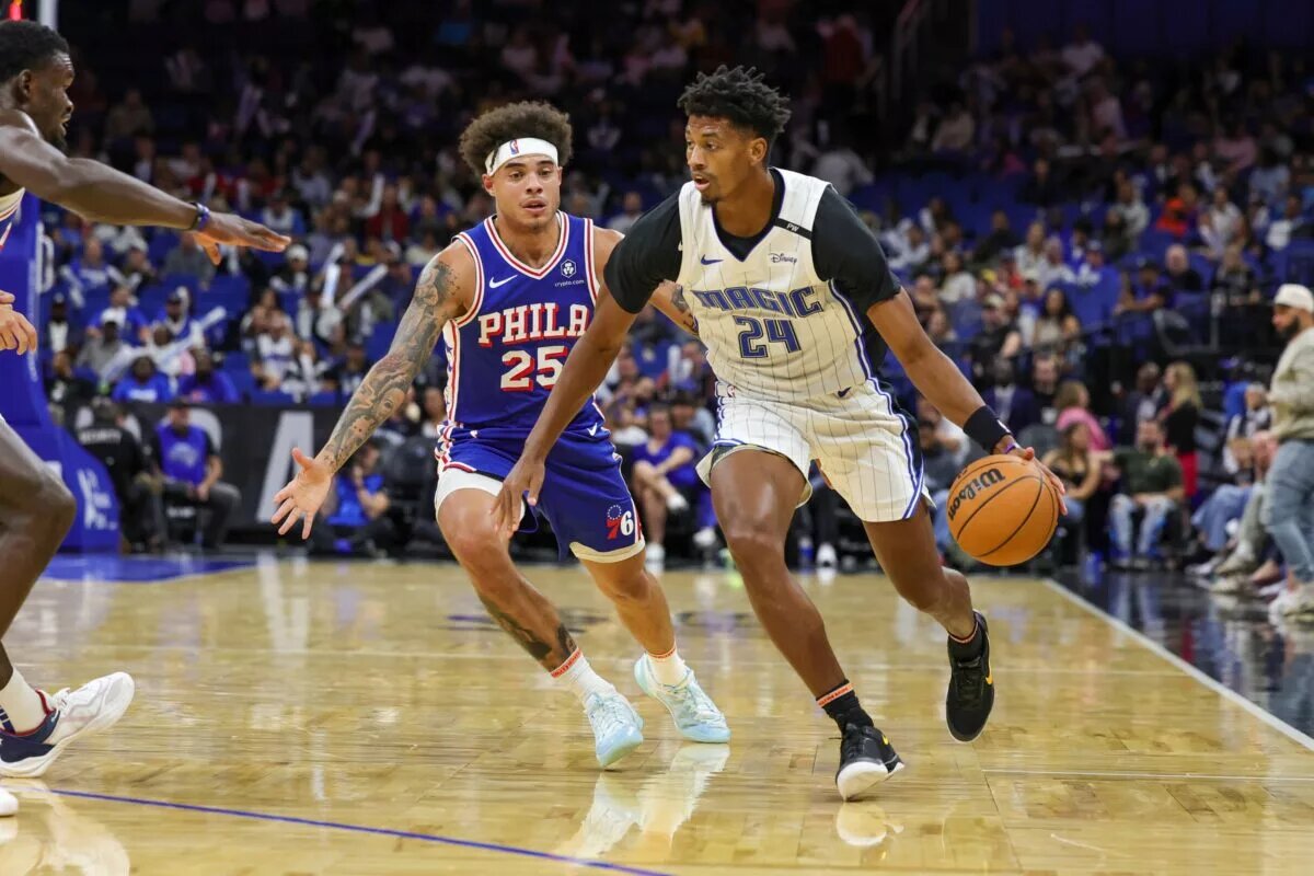 Oct 18, 2024; Orlando, Florida, USA; Orlando Magic guard Jarrett Culver (24) drives around Philadelphia 76ers guard Lester Quinones (25) during the second half at Kia Center. Mandatory Credit: Mike Watters-Imagn Images