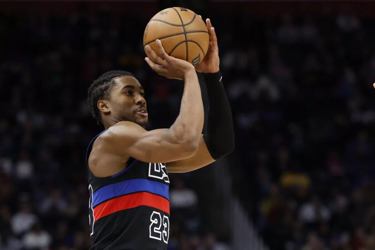 Nov 30, 2024; Detroit, Michigan, USA; Detroit Pistons guard Jaden Ivey (23) shoots in the first half against the Philadelphia 76ers at Little Caesars Arena. Mandatory Credit: Rick Osentoski-Imagn Images