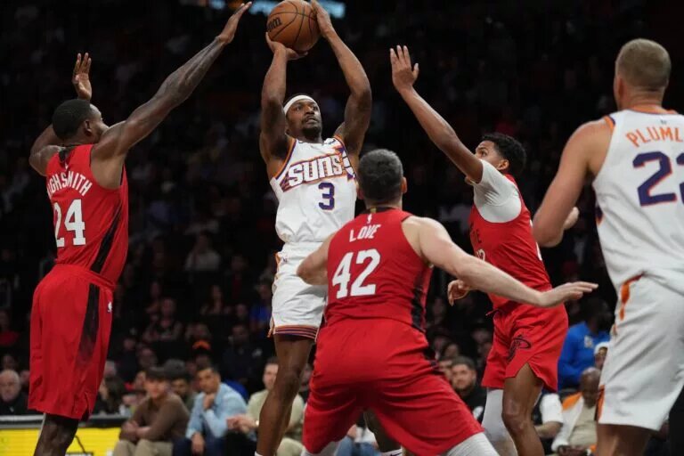 Miami Heat defenders Dru Smith and Haywood Highsmith attempt a defensive stop
