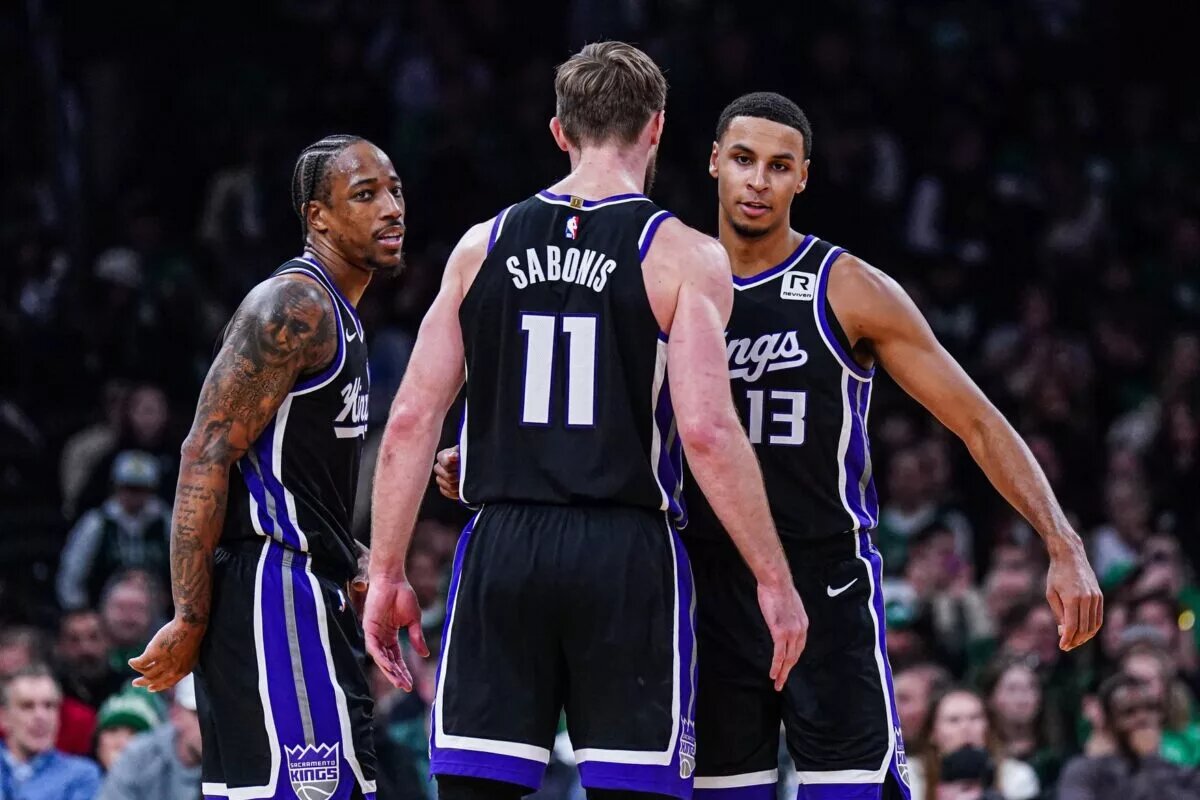 Sacramento Kings forward DeMar DeRozan (10), forward Keegan Murray (13) and forward Domantas Sabonis