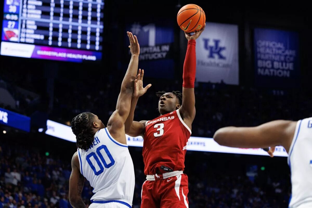 Feb 1, 2025; Lexington, Kentucky, USA; Arkansas Razorbacks forward Adou Thiero (3) shoots the ball over Kentucky Wildcats guard Otega Oweh (00) during the first half at Rupp Arena at Central Bank Center. Mandatory Credit: Jordan Prather-Imagn Images