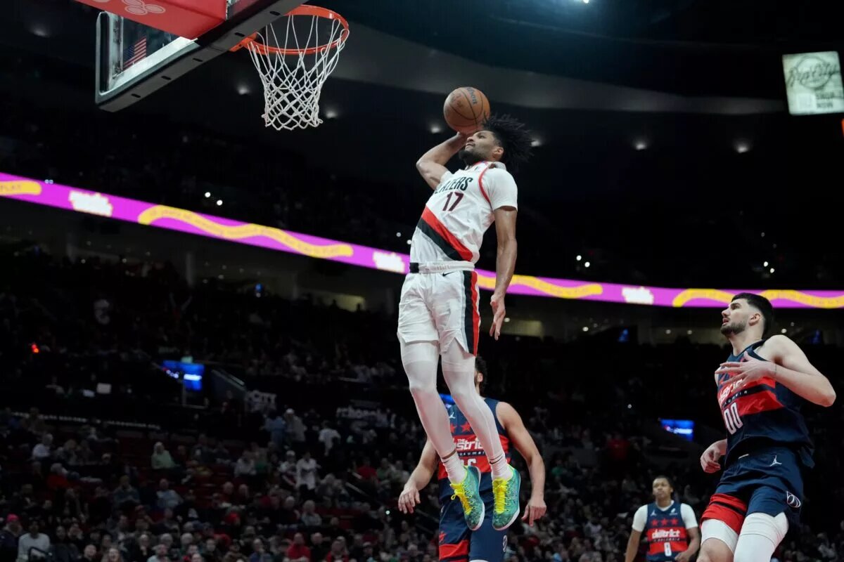 Mar 17, 2025; Portland, Oregon, USA; Portland Trail Blazers shooting guard Shaedon Sharpe (17) goes up for a dunk during the second half against the Washington Wizards at Moda Center. Mandatory Credit: Soobum Im-Imagn Images