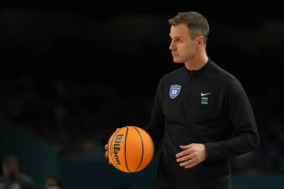 Apr 5, 2025; San Antonio, TX, USA; Duke Blue Devils head coach Jon Scheyer looks on against the Houston Cougars during the second half in the semifinals of the men's Final Four of the 2025 NCAA Tournament at the Alamodome. Mandatory Credit: Bob Donnan-Imagn Images