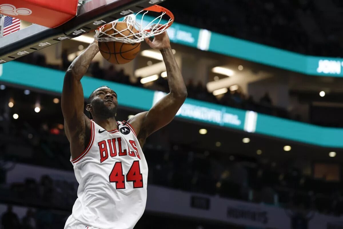 Apr 6, 2025; Charlotte, North Carolina, USA; Chicago Bulls forward Patrick Williams (44) dunks against the Charlotte Hornets during the second half at Spectrum Center. Mandatory Credit: Nell Redmond-Imagn Images