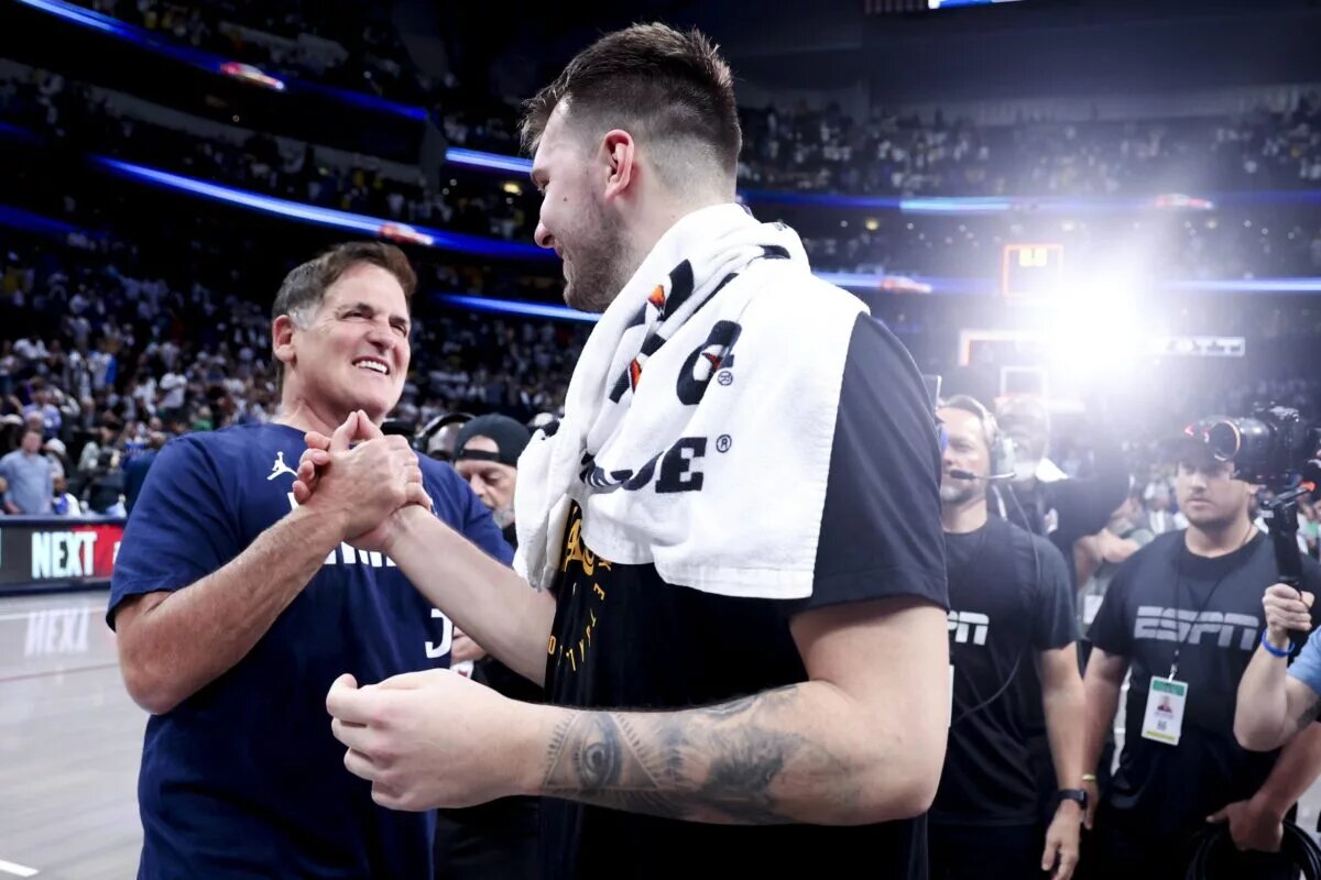 Apr 9, 2025; Dallas, Texas, USA; Los Angeles Lakers guard Luka Doncic (77) hugs Mark Cuban after the game against the Dallas Mavericks at American Airlines Center. Mandatory Credit: Kevin Jairaj-Imagn Images
