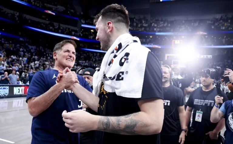 Apr 9, 2025; Dallas, Texas, USA; Los Angeles Lakers guard Luka Doncic (77) hugs Mark Cuban after the game against the Dallas Mavericks at American Airlines Center. Mandatory Credit: Kevin Jairaj-Imagn Images