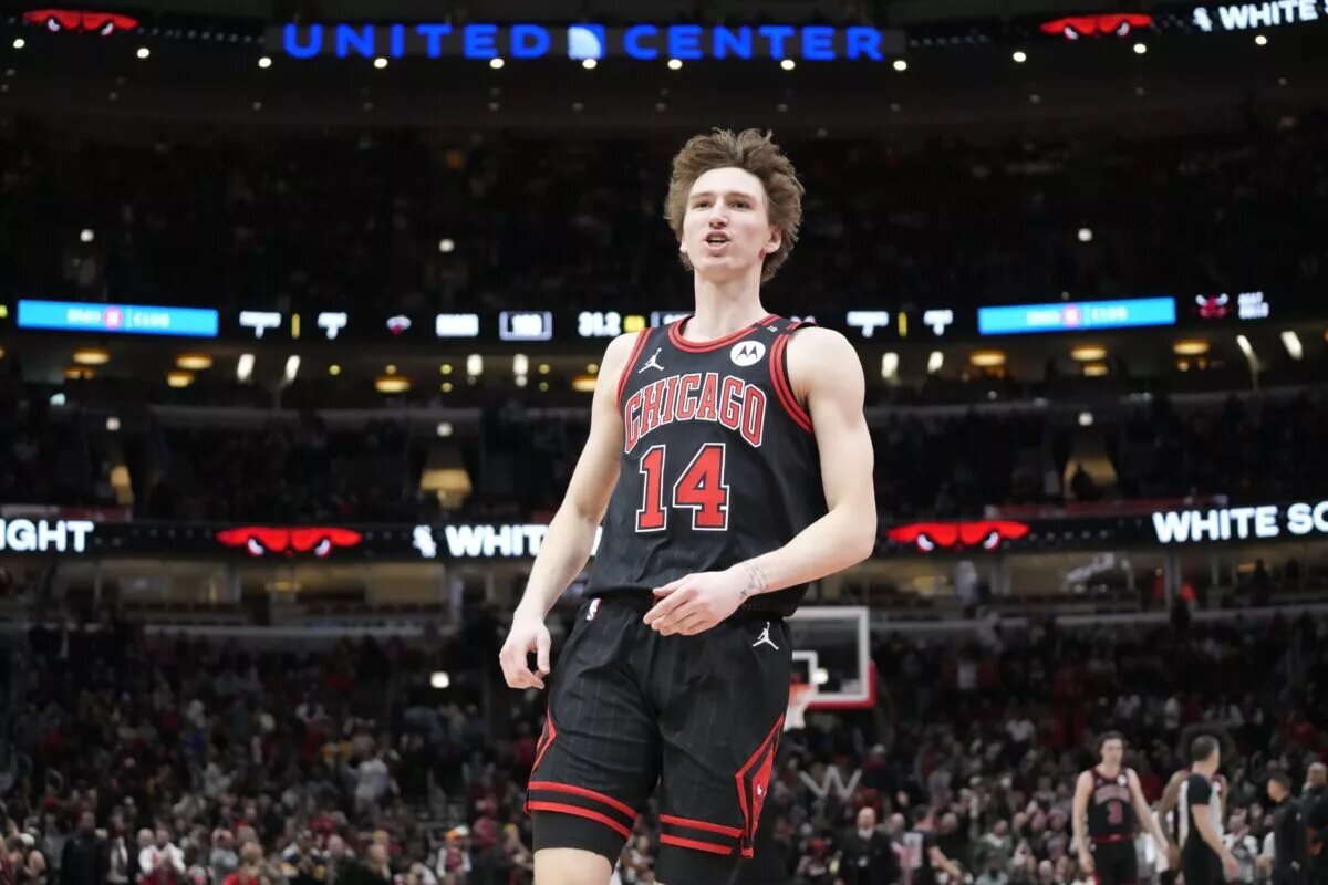 Apr 9, 2025; Chicago, Illinois, USA; Chicago Bulls forward Matas Buzelis (14) celebrates his three point basket against the Miami Heat during the second half at United Center. Mandatory Credit: David Banks-Imagn Images
