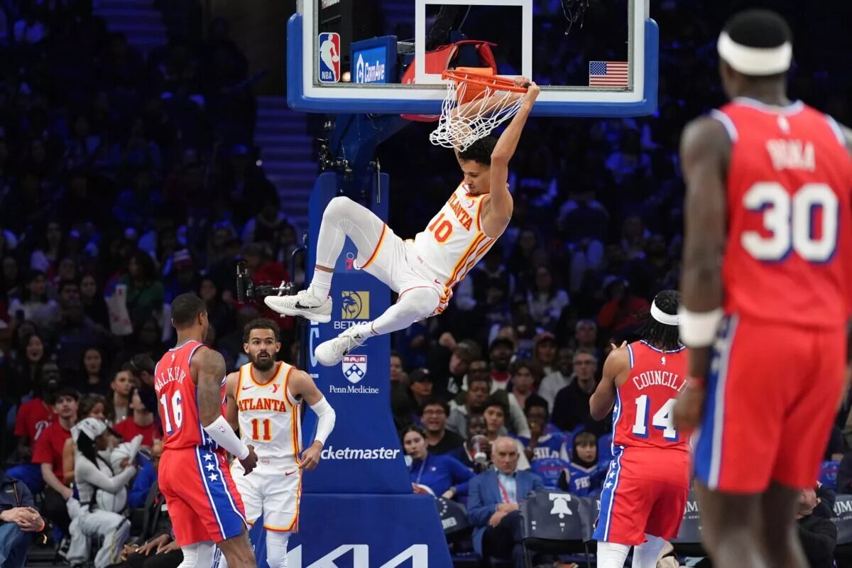 Apr 11, 2025; Philadelphia, Pennsylvania, USA; Atlanta Hawks forward Zaccharie Risacher (10) dunks against the Philadelphia 76ers in the third quarter at Wells Fargo Center. Mandatory Credit: Kyle Ross-Imagn Images