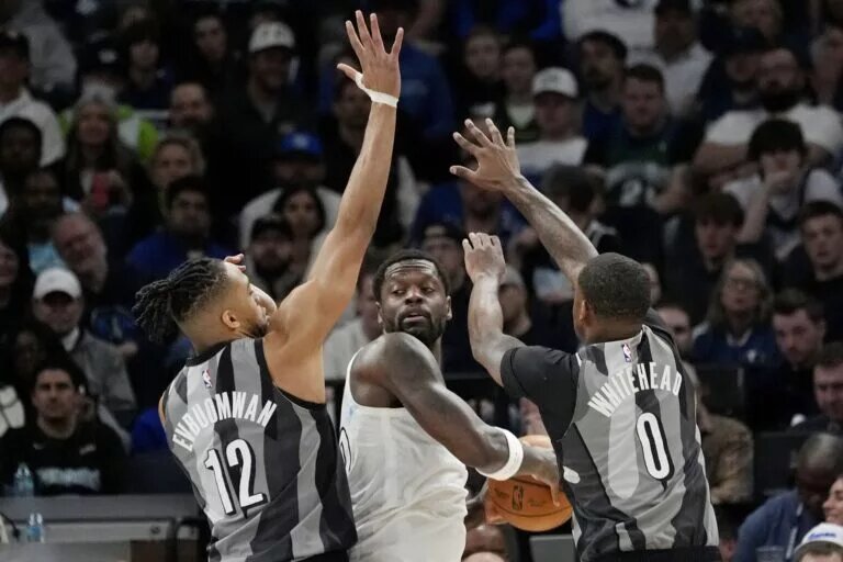 Brooklyn Nets forward Tosan Evbuomwan and wing Dariq Whitehead guard Minnesota Timberwolves forward Julius Randle