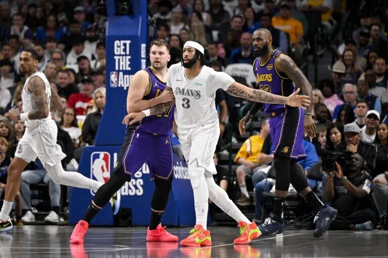 Apr 9, 2025; Dallas, Texas, USA; Los Angeles Lakers guard Luka Doncic (77) and forward LeBron James (23) and Dallas Mavericks forward Anthony Davis (3) in action during the game between the Dallas Mavericks and the Los Angeles Lakers at American Airlines Center. Mandatory Credit: Jerome Miron-Imagn Images