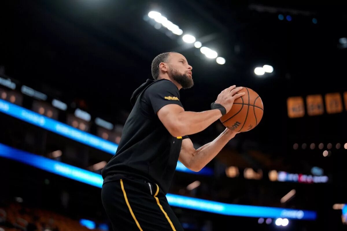 May 2, 2025; San Francisco, California, USA; Golden State Warriors guard Stephen Curry (30) shoots the ball during warmups against the Houston Rockets before the start of game six of the first round for the 2025 NBA Playoffs at Chase Center. Mandatory Credit: Cary Edmondson-Imagn Images