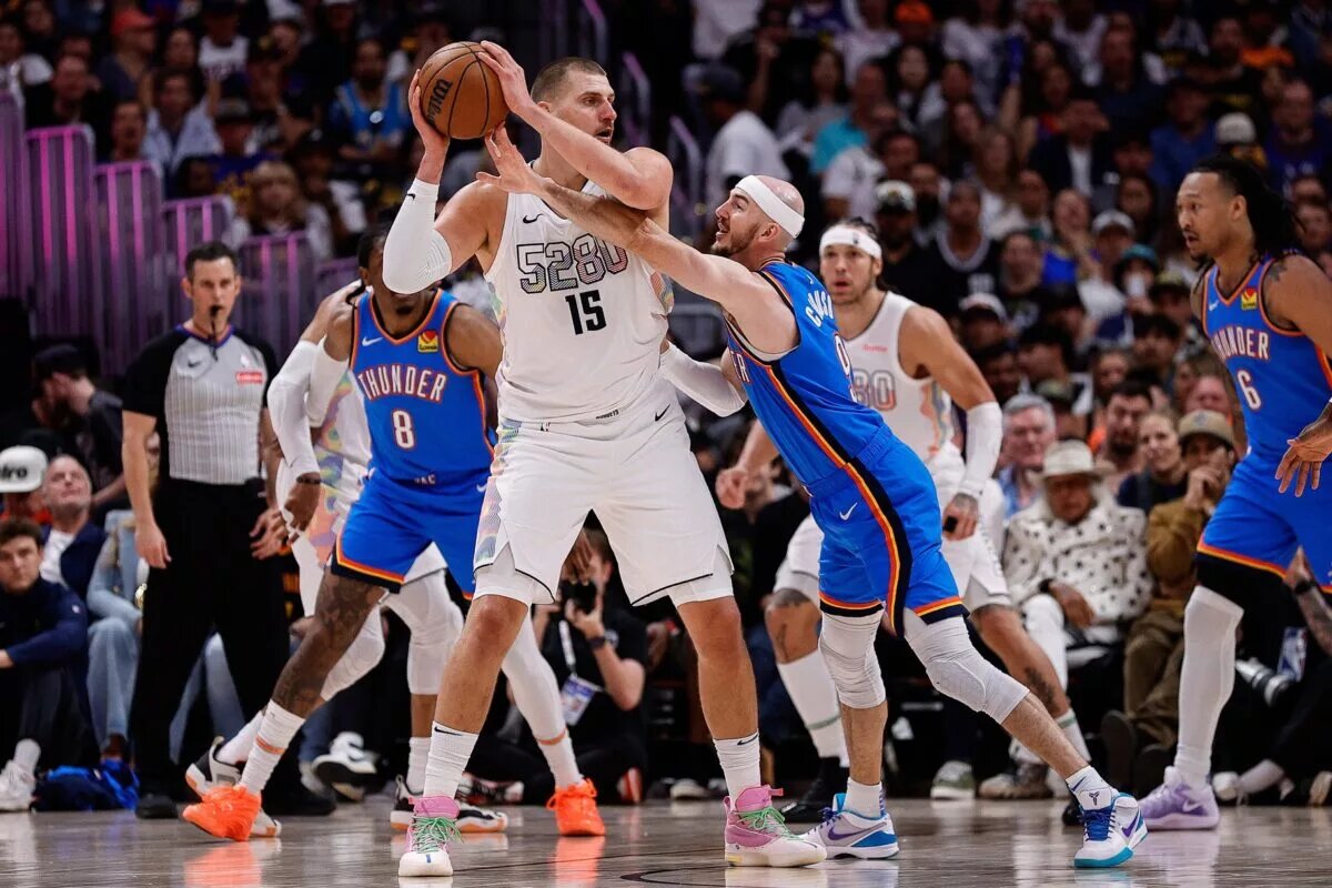 May 15, 2025; Denver, Colorado, USA; Denver Nuggets center Nikola Jokic (15) controls the ball under pressure form Oklahoma City Thunder guard Alex Caruso (9) in the second quarter during game six of the second round for the 2025 NBA Playoffs at Ball Arena. Mandatory Credit: Isaiah J. Downing-Imagn Images