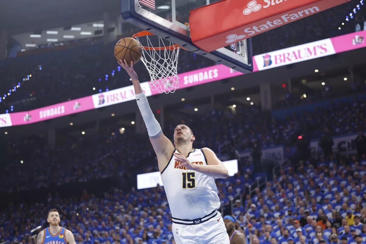 May 18, 2025; Oklahoma City, Oklahoma, USA; Denver Nuggets center Nikola Jokic (15) goes to the basket against the Oklahoma City Thunder in the first quarter during game seven of the second round for the 2025 NBA Playoffs at Paycom Center. Mandatory Credit: Alonzo Adams-Imagn Images