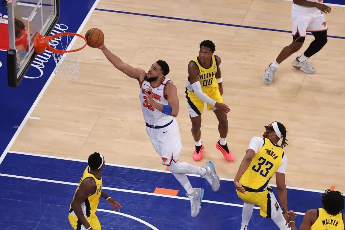 May 29, 2025; New York, New York, USA; New York Knicks center Karl-Anthony Towns (32) shoots against the Indiana Pacers in the fourth quarter during game five of the eastern conference finals for the 2025 NBA Playoffs at Madison Square Garden. Mandatory Credit: Brad Penner-Imagn Images