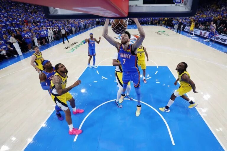 Jun 22, 2025; Oklahoma City, Oklahoma, USA; Oklahoma City Thunder forward Chet Holmgren (7) dunks against the Indiana Pacers during the second half during game seven of the 2025 NBA Finals at Paycom Center. Mandatory Credit: Matthew Stockman-Pool Photo via Imagn Images