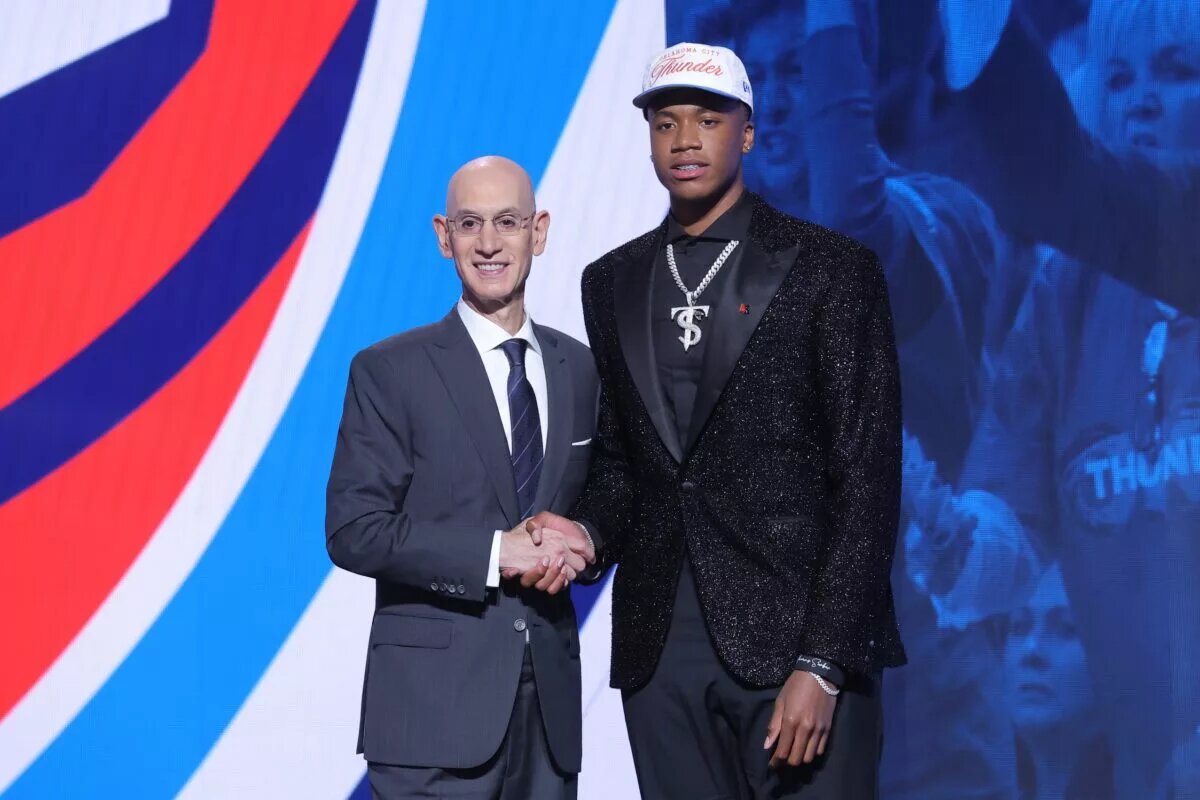 Jun 25, 2025; Brooklyn, NY, USA; Thomas Sorber stands with NBA commissioner Adam Silver after being selected as the 15th pick by the Oklahoma City Thunder in the first round of the 2025 NBA Draft at Barclays Center. Mandatory Credit: Brad Penner-Imagn Images