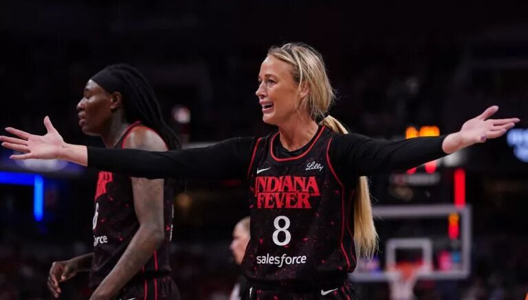 Indiana Fever guard Sophie Cunningham (8) reacts to a call from the referee on Tuesday, Aug. 12, 2025, during the game at Gainbridge Fieldhouse in Indianapolis. The Dallas Wings defeated the Indiana Fever, 81-80.