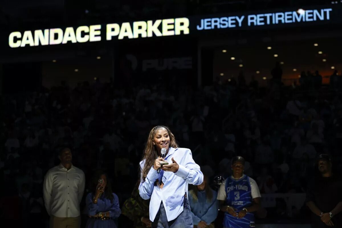 Aug 25, 2025; Chicago, Illinois, USA; Chicago Sky franchise legend and WNBA Champion Candace Parker speaks during her jersey retainment ceremony during a WNBA game between the Chicago Sky and Las Vegas Aces at Wintrust Arena. Mandatory Credit: Kamil Krzaczynski-Imagn Images