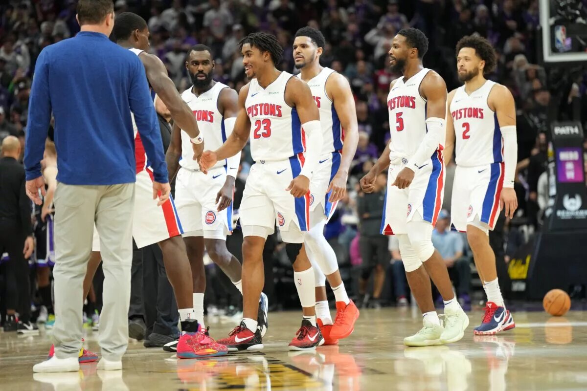 Dec 26, 2024; Sacramento, California, USA; Detroit Pistons guard Jaden Ivey (23) celebrates with teammates after a three point basket and foul against the Sacramento Kings during the fourth quarter at Golden 1 Center. Mandatory Credit: Kelley L Cox-Imagn Images