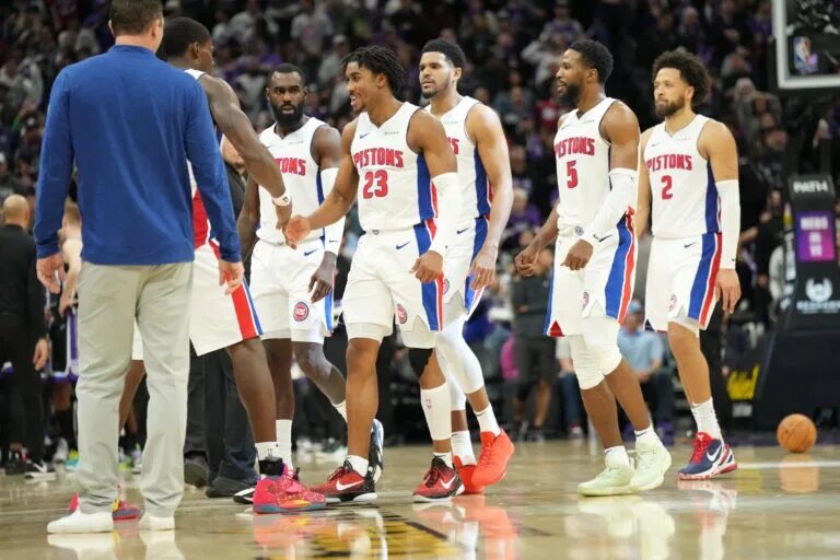 Dec 26, 2024; Sacramento, California, USA; Detroit Pistons guard Jaden Ivey (23) celebrates with teammates after a three point basket and foul against the Sacramento Kings during the fourth quarter at Golden 1 Center. Mandatory Credit: Kelley L Cox-Imagn Images